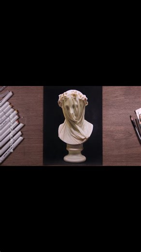 Colored pencil drawing by artist Ye Wuqu (Douyin) — a stunning study of form, light, and texture capturing the delicate drapery over a classical bust with extraordinary precision and realism. Artist: Ye Wuqu (Douyin) #coloredpencilart #realismdrawing #artstudy #portraitdrawing #hyperrealism | Color Pencil Masters
