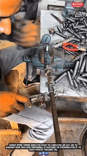 Worker shaping wire springs with a manual threading tool for precise production results