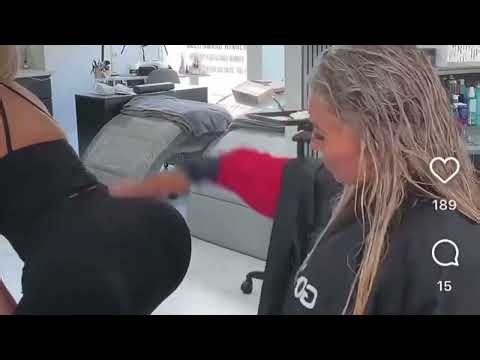 Hairdresser giving client sexy lap dance