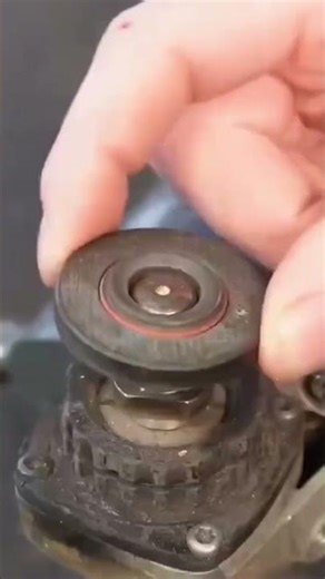 The process of assembling an electric grinder by a man meticulously