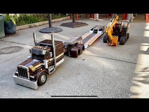 RC4WD Excavator and Lowboy Trailer towed by Custom Tamiya Grand Hauler
