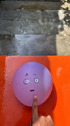 Experiment: Dropping an emoji water balloon from the top of a ladder, does it explode?