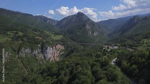 Aerial panoramic drone view of iconic Djurdjevica Tara concrete arch bridge over the river Tara, Montenegro