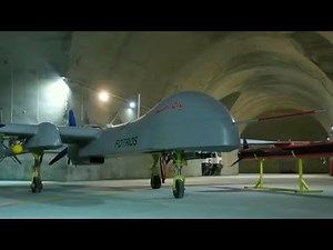 Iran unveils underground air force base with drones and missiles