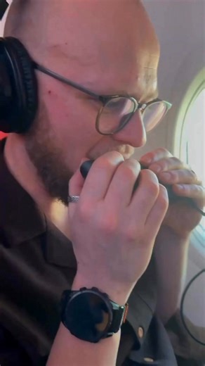 Practicing harmonica at 30.000ft… sort of 😅✈️ It’s a MIDI harmonica, so everyone around me only hears my breathing… …but in my headphones I’ve got a fat double bass🎧 Silent practice mode: ON. #harmonica #midiharmonica #practice #musicianlife #travelgig | Irish Harmonica