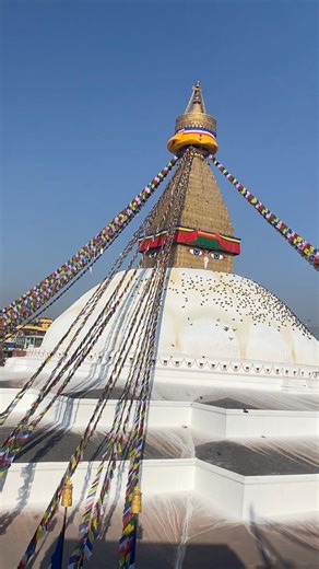 Boudha Stupa, also known as Boudhanath Stupa, is one of the largest and most sacred Buddhist stupas in the world, located in Boudha, Kathmandu, Nepal. Also known as Khasti Mahachaitya, this UNESCO World Heritage Site stands as a symbol of peace, wisdom, and compassion. The massive white dome represents purity, while the all-seeing eyes of the Buddha remind us of awareness and mindfulness. Walking clockwise around the stupa (kora) in silence and devotion creates a deeply peaceful and spiritual at