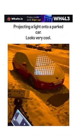 Elixo on Instagram: "- The post showcases a 23-second video of projection mapping on a snow-covered red car in a nighttime urban setting, using a home projector to overlay a grid for alignment and then animate Lightning McQueen’s face from Pixar’s Cars, creating a whimsical transformation. - Projection mapping, pioneered in the 1960s but popularized in the 2000s for events like building facades, has become DIY-accessible; a 2023 study in the Journal of Visual Communication and Image Representati