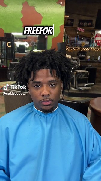 Low Taper Haircut with Freeform Dreads: A Stylish Combination