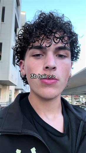 Embrace Your Curls: Men's Haircut Inspirations