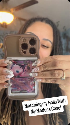 PokeBaeKC | Pokémon TCG Content Creator on Instagram: "I love when my phone case matches my nails! 💗✨ @medusacasecom sent me this case and I’m honestly obsessed with how easy it is to swap cards and keep them secure. Which Pokémon card would you put in yours? 👀 Follow for more Pokémon pulls, collector finds, and nerdy content, and turn on post notifications so you don’t miss the next rip or live stream! #pokemon #pokemoncommunity #rippingpacks #girlstreamer #medusacase . . . Pokémon card colle