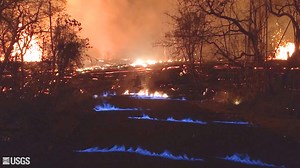 Rare blue flames burn in cracks from Hawaii volcano