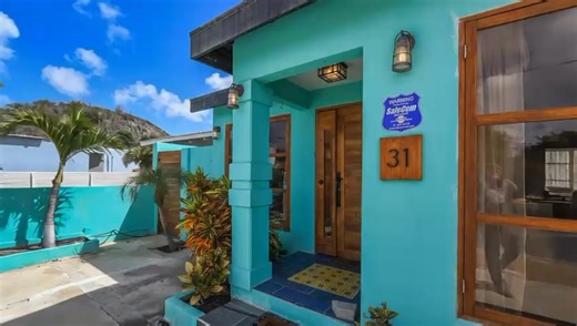 🏡 Island Living with Style & Soul 🌴 This beautifully designed residence blends character, comfort, and relaxed Caribbean living. From the vibrant exterior and gated yard to the private pool with waterfall feature , this home is made for enjoying life—inside and out. ✨ High ceilings with exposed wood beams 🏊‍♂️ Private pool & shaded lounge areas 🛏️ Versatile layout with loft-style spaces 🍽️ Modern, functional kitchen 🚗 Fully fenced & gated for privacy Perfect as a private residence, vacatio