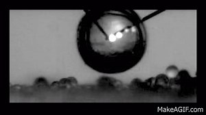 Cavitation bubbles bursting with cleaning power - Science Nation on Make a GIF