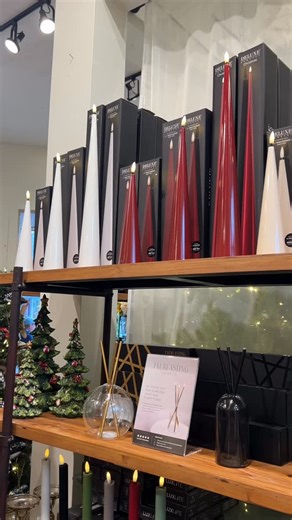 Back by popular demand! Light up your space with our Deluxe battery-operated wax cone candle — crafted from real wax, complete with a flickering LED flame, remote-controlled timer, and zero fire hazard. Perfect for mantels, side tables, and festive décor — your cozy season just got elevated. | Seasons Home And Gift | Facebook