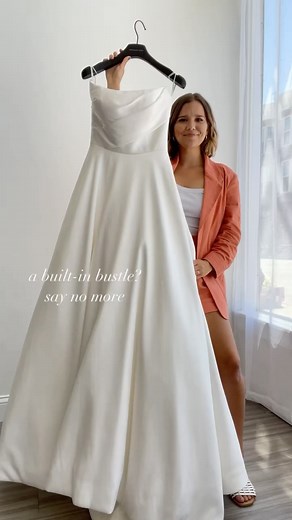 Justin Alexander on Instagram: "A built-in bustle is what’s IT 🙌✨ Envision the gorgeous floating bow cascading down your train as you walk down the aisle for your ceremony… Then, when you’re ready for the reception, just clasp the bow at your waist and you’re set to dance the night away! #JustinAlexander #Style_Estelle - #bustle #dressbustle #bow #weddingstyle #weddingdresstrends #weddingdress #trendingnow #pockets #elegantstyle #bridestyle #2023bride"