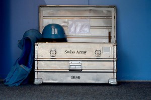 What is the role of Swiss military observers?