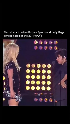 History Frame on Instagram: "The moment when Britney Spears and Lady Gaga almost kissed at the 2011 MTV Video Music Awards is one of those wild, glittery pop-culture memories that still makes people blink twice. At the show, Gaga appeared in full character — dressed as her male alter-ego Jo Calderone — to present Britney with the prestigious Michael Jackson Video Vanguard Award, honoring her impact on pop music. ￼ When Gaga/Calderone brought Britney on stage and handed her the award, there was a