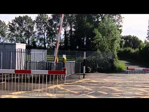 Modern Irish Railway Level Crossing with barrier gates HD (Blakestown Level Crossing)