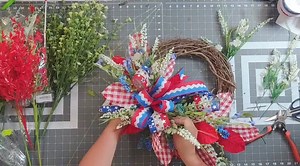 Coach Jordan is showing us how to make a GORGEOUS, yet simple, patriotic grapevine. You won't believe how he transforms these supplies into the the final product! Let us know if you're trying this one, too! | DecoExchange