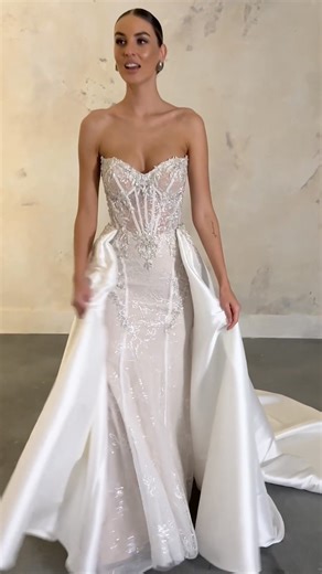 Bridal train and overskirt 101: ✨ Bridal trains - the ultimate statement piece! Adds an extra element of drama that trails behind you as you walk! From simple to floral and even embellished, there are wedding gown trains for every bride. ✨Overskirts - wedding dress overskirts give you the perfect 2-in-1 bridal look! The detachable layer of fabric wraps around your waist and comes in a variety of volumes, fabrics, and embellishments a bride can dream of. Check out our blog, 'Add A Detachable Wedd