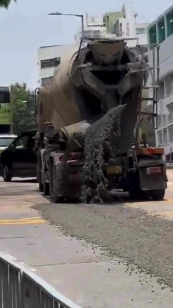 Cement Truck Spills Concrete on the Road