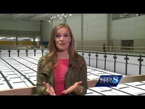 Years after construction began, crews begin filling Olympic pool