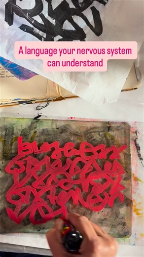 Margie Woods | Mixed Media Artist | Art Workshops on Instagram: "This is one of many ways I invite people to bypass the thinking mind and listen inward. Asemic writing becomes a conversation with the body. No words to get right. No meaning to chase. Just marks, movement, and sensation. In my workshops, we use practices like this to gently tap into inner wisdom and emotional truth, the kind that lives beneath language. What emerges is always personal, honest, and often surprising….not to mention,