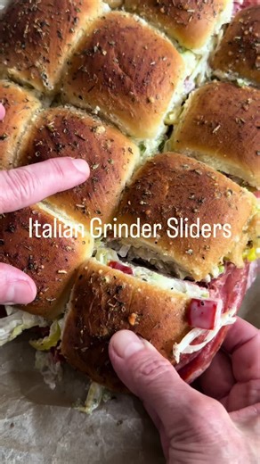 Italian Grinder Sliders We’re still making new sliders every week in our quest to find the perfect beach sandwich. These grinders are the mini version of the classic sandwich and they are totally yummy. Packed with flavor in every bite and the gooey melted cheese takes them to the next level. They’re super easy to make and perfect for packing for a beach day. 1 package slider buns like kings Hawaiian Deli sliced ham 2-3 oz Sliced pepperoni 2-3 oz Sliced salami 2-3 oz Sliced provolone or mozzarel