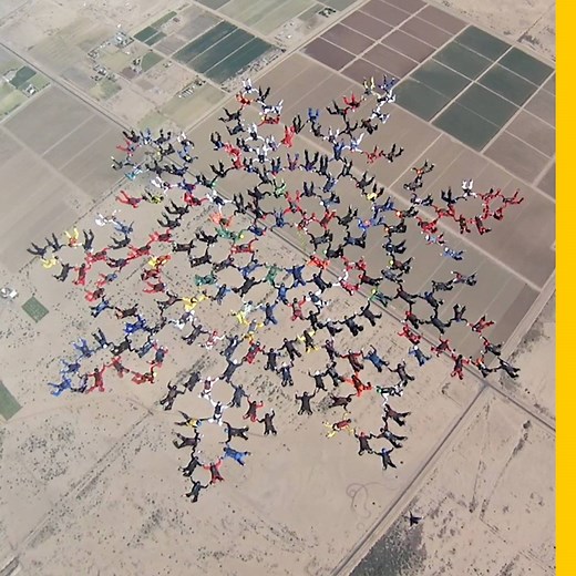 26M views · 105K reactions | Watch more than 200 skydivers perform a record-setting synchronized jump high above Eloy, Arizona. | National Geographic Science | Facebook