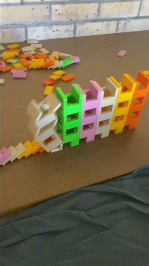 Satisfying falling domino towers! #satisfying #domino #shorts