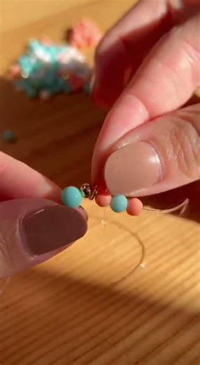 bracelet making step by step Hands slide the final bead #beadcraft #artandcraf #diyjewelry