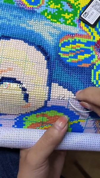 Colorful Cross-Stitch Project: Crafting a Cartoon Design