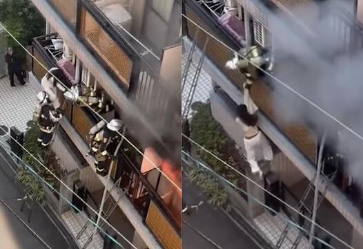 Panic Mode: Woman In Japan Kicks Firefighter Off Ladder During Rescue Attempt!
