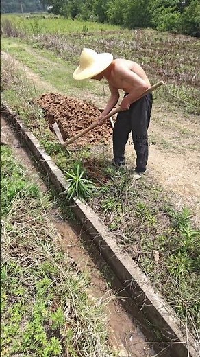 The process of digging trenches manually