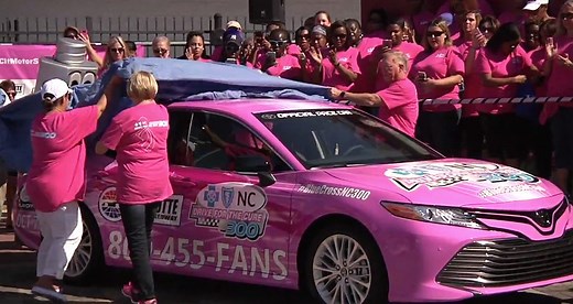 NASCAR stars paint the wall pink at Charlotte Motor Speedway