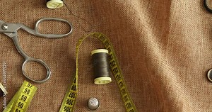 textile and tools on tailor desk
