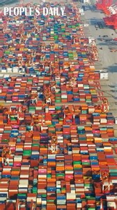 Yangshan Deep Water Port in Shanghai, the world's biggest automated container terminal, has been upgraded with the Fifth Generation Fixed Network (F5G). A crane can be remotely controlled from 100 km away, with a latency of around 100 microseconds. | People's Daily, China