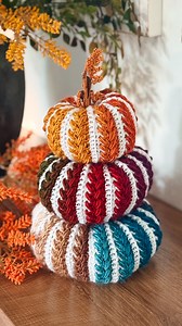 ✨ Say PS3 but Warning: starting this crochet pumpkin may cause… an unstoppable pumpkin patch to grow in your living room 😏🎃 What colors would you pick for yours? (I need inspo for my next one!) 🍂 It’s officially pumpkin crochet season and I can’t stop making these squishy, cozy handmade pumpkins! 🧶 Whether you’re decorating your fall home, looking for DIY pumpkin décor, or just love a quick and easy crochet fall project, this pattern is perfect. Grab your yarn, pick your favorite fall colors