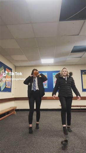 2 girls shoes off dancing in socks in the classroom. #schoolsocks #schoolshoes #blacksocks #whitesocks #2step #shoes #socks #dance #nikesocks #uniform #anklesocks #school