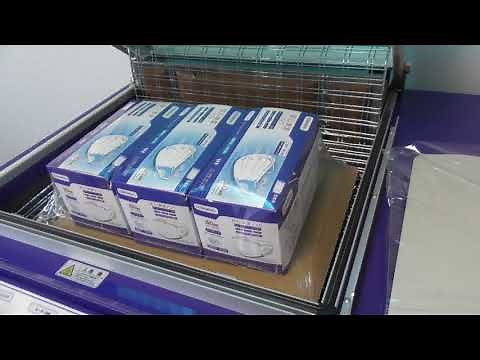 簡易シュリンク包装機 STY-60M 包装対象物（段ボール台紙と複数商品2）