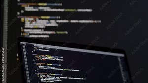 Real Javascript code. Front end web development. Java script JS code on laptop screen. Web design concept.