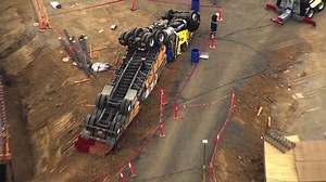 Fully-loaded lumber truck flips over at Menlo Park construction site