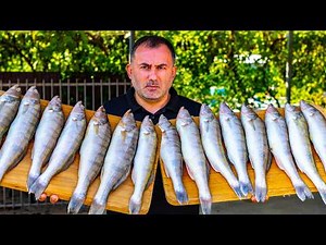 FISH with VEGGIES in a CAULDRON in the OPEN FIRE.