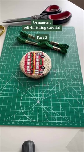 ✨ORNAMENT SELF-FINISHING TUTORIAL PART 5✨ It’s finally time to make cording! I like to use DMC embroidery floss to make my cording. You can also use DMC pearl cotton or something similar, you just might have to adjust the number of stands you use. I manually make my cording using a door hanger, but you could also use a door knob or something similar. Let me know if you have any questions!! The final part in this series will come out tomorrow! #ndlpt #needlepoint #needlepointtiktok #needlepointfi