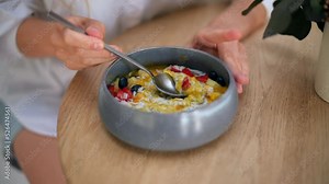 Chia pudding mixing. Smoothie is poured into a bowl. Banana, Strawberry, nectarine.