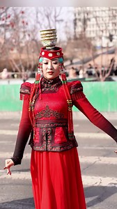 Amazing and graceful! In this video, a girl from Ordos showcases her exquisite Mongolian Bowl Balancing Dance skill. Whatever her posture is, the bowl stands firmly on her head! Can't resist the temptation to have a look! | Discover Ordos