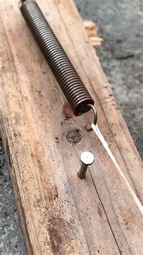 This is one way to pull the spring easily and simply using a rope.#creative