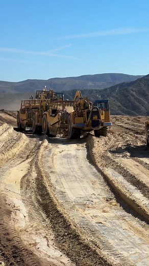 Cat 657 Scrapers in Action - LB3 Enterprises