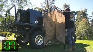 This bolt on shower tent sets up in 7 SECONDS and is guaranteed to get your partner out camping more! It does NOT come with Jocko in side. Get a FREE lithium shower with one of these genius tents by using code 4DW247 at 👉 bit.ly/shower-freebie | 4WD 24/7