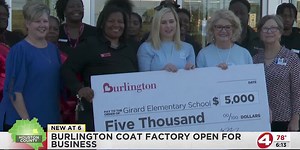 Burlington Coat Factory open for business, donating to the Girard Primary School